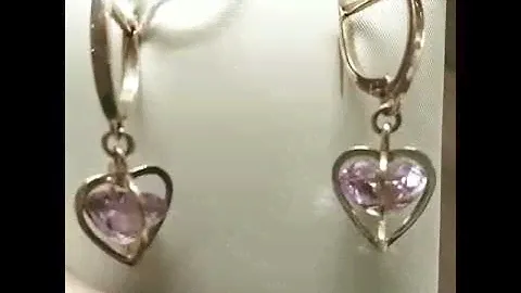 Серьги с камнями в золотой оправе